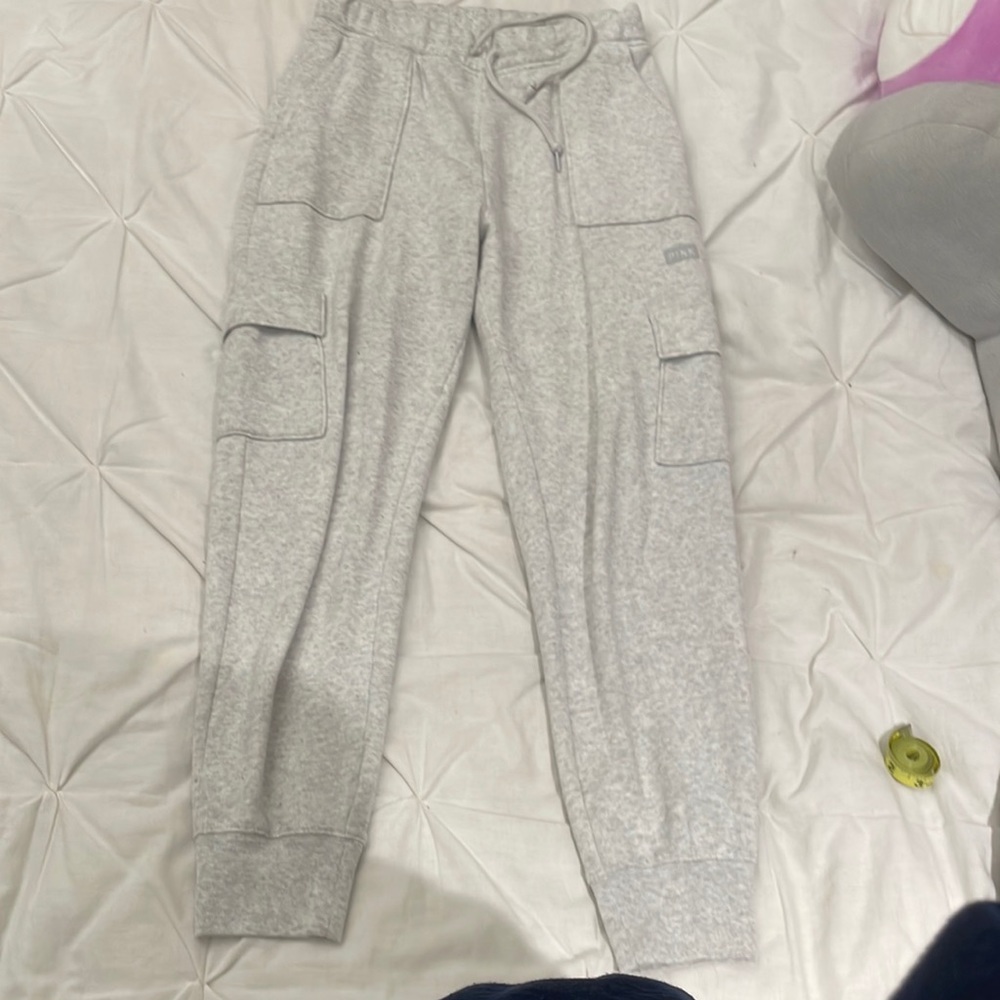 Light Grey PINK cargo joggers with 4 pockets, drawstring, and sleeve cuffs